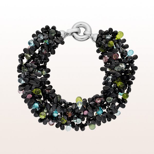 Bracelet with black spinel, aquamarine, pink topaz, green sapphire, peridot and apatite with a silver clasp