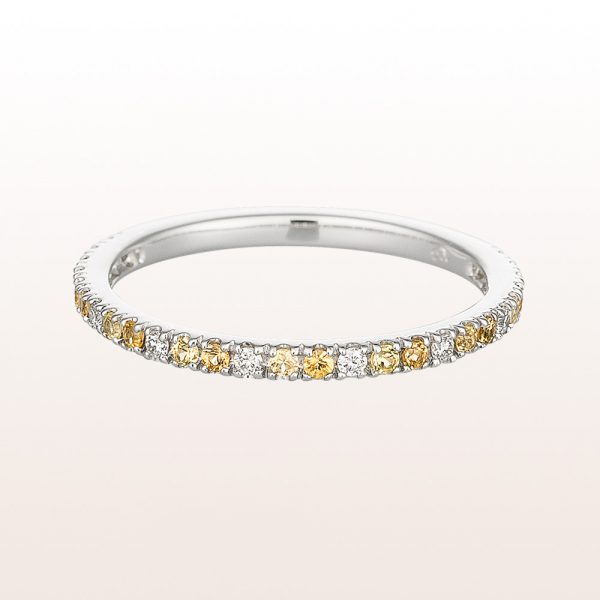 Ring with yellow sapphire and brilliant cut diamonds in 18kt white gold
