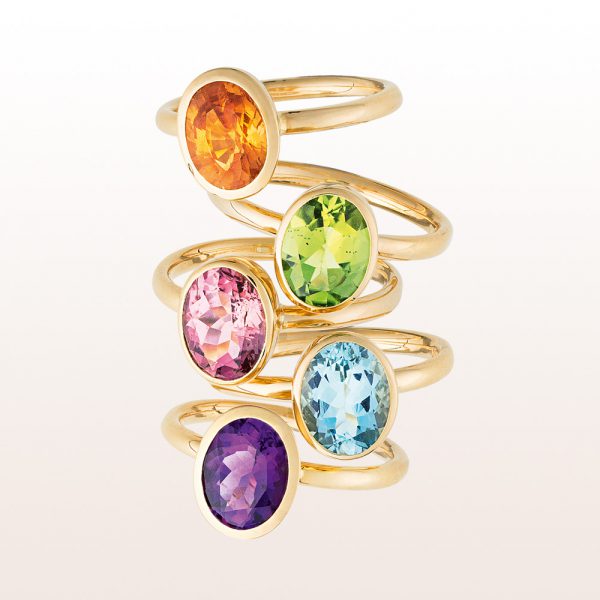 Collection rings with mandarin garnet, peridot, rubellite, aquamarine and amethyst in 18kt yellow gold
