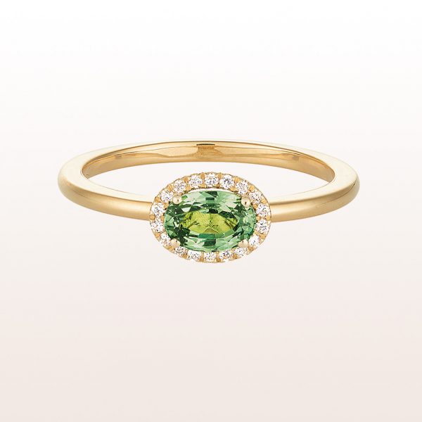 Ring with green sapphire 0,73ct and brilliant cut diamonds 0,06ct in 18kt yellow gold