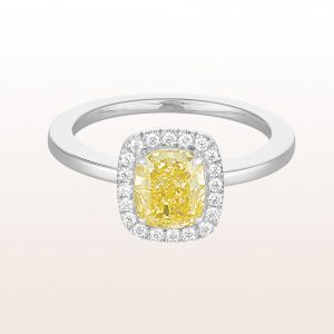 Ring mit fancy yellow cushion Diamant 1,43ct und Brillanten 0,16ct in18kt Weißgold