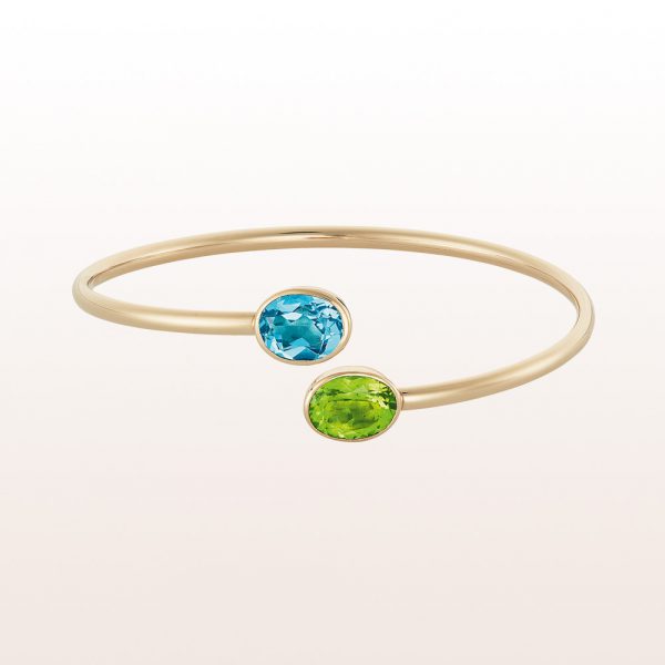 Bracelet with topaz 3,11ct and peridot 2,93ct in 18kt yellow gold