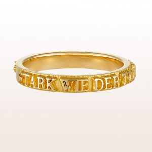 Ring "Bibel" from the designer Sebastian Menschhorn with a biblical saying in 18kt yellow gold